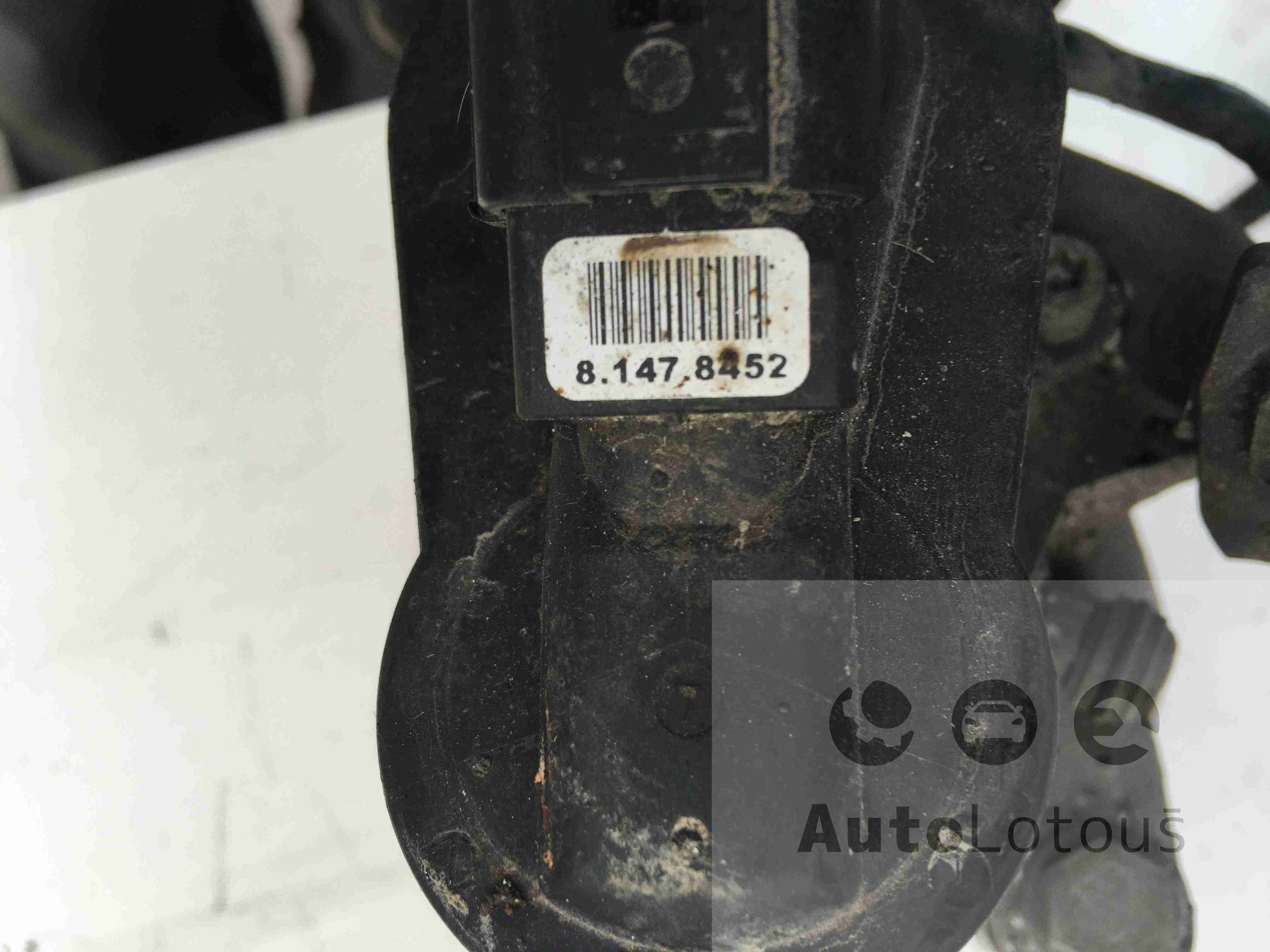 Levý zadní el. brzdič VW Passat B6